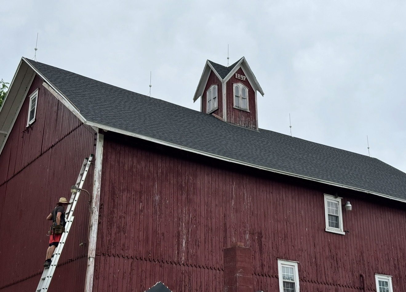 Historic red barn dated 1897 fitted with lightning protection